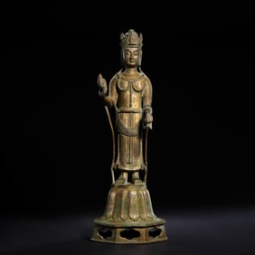 A standing gilt bronze Buddha statue from the Northern Wei Dynasty, China