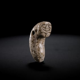 Chicken bone and white jade silkworm from the Hongshan culture of the Neolithic Age in China