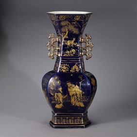 A Chinese Qing Dynasty blue and gold-painted double-handled vase with Bogu patterns
