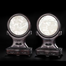 A pair of Chinese Qing Dynasty rosewood and Hetian white jade screens