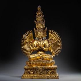 A Chinese Ming Dynasty gilt bronze statue of a seated Buddha