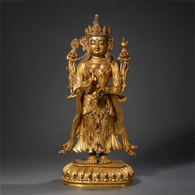 A Chinese Ming Dynasty gilt bronze standing Buddha statue