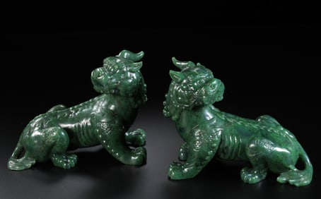 A pair of Chinese Han Dynasty Hetian jade auspicious beasts