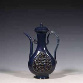 A Chinese Yuan Dynasty blue-glazed pot with floral patterns