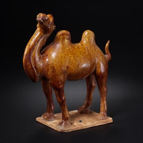 Yellow-glazed coiled camel statue from the Tang Dynasty, China