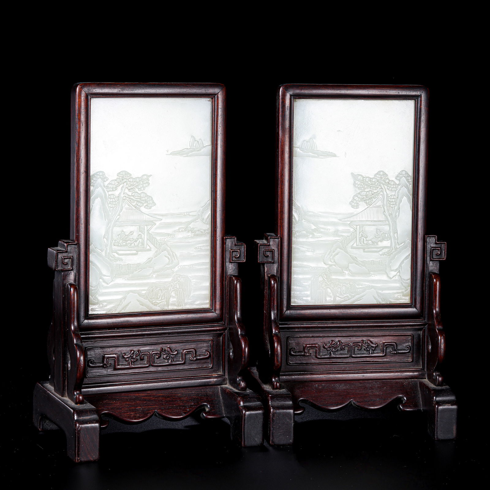 A pair of Chinese Qing Dynasty rosewood and Hetian white jade screens