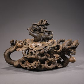 Chinese Qing Dynasty wooden ewer with dragon design