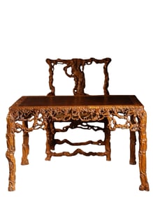 A set of boxwood official hat chairs and tables that have been repatriated from overseas