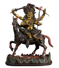 A partially gilded bronze seated Buddha statue from the Qing Dynasty in China.