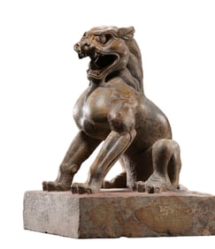 Chinese Tang Dynasty seated bluestone lion statue