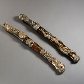 A pair of Japanese dragon and phoenix silver gilt short swords