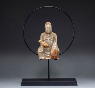 Seated figure made of Hetian jade from the Liao Dynasty, China