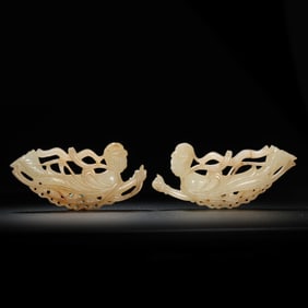 A pair of Chinese Liao Dynasty Hetian jade flying apsara statues