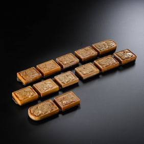 A set of Liao Dynasty amber belt plaques
