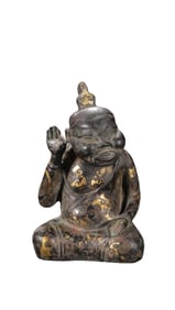 Seated figure inlaid with gold and silver from the Warring States period of China