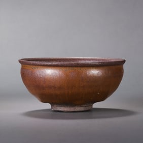 Jian ware persimmon-red glazed cup with constricted rim from the Southern Song Dynasty