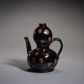 A gourd-shaped ewer with iron embroidery from the Cizhou kiln of the Northern Song Dynasty, China.