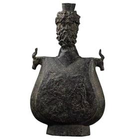Achaemenid period bronze flat flask with the head of Dionysus