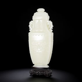 Chinese Qing Dynasty Hetian white jade double-eared covered vase with animal mask design