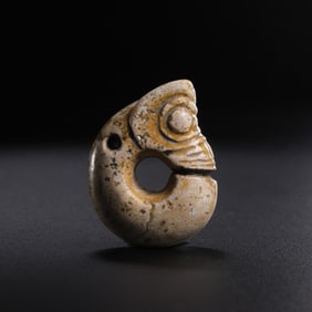 Chicken-bone white jade pig dragon from the Hongshan Culture of the Neolithic period in China