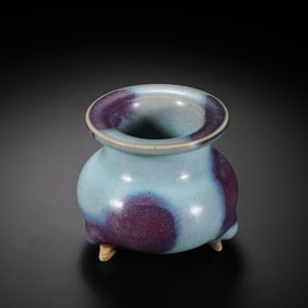 A three-legged censer with sky-blue glaze and red trim from the Jun kiln of the Northern Song