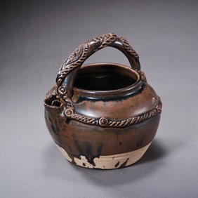 A purple-gold glazed ewer from the Cizhou kiln of the Northern Song Dynasty, China.