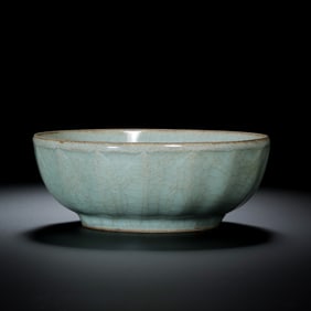 Southern Song Dynasty official kiln celadon wash basin with crackle and lotus petal design.