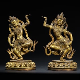 pair of Chinese Ming Dynasty gilt bronze standing Buddha statues