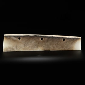 Three-holed jade knife from the Chinese Neolithic period