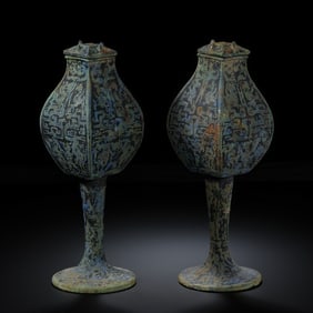 A pair of Chinese Warring States period inlaid gold and silver high-footed square covered pots