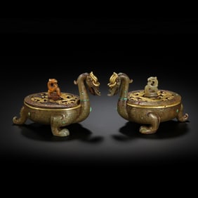 A pair of Chinese Han Dynasty inlaid gold and gemstone jade dragon-shaped censers