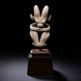 Chicken-bone white jade sun god statue from the Hongshan Culture of the Neolithic period in China