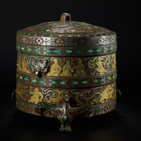A three-legged covered censer inlaid with gold and silver and emeralds from the Warring States
