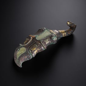 Gold and silver inlaid belt hooks from the Warring States period in China