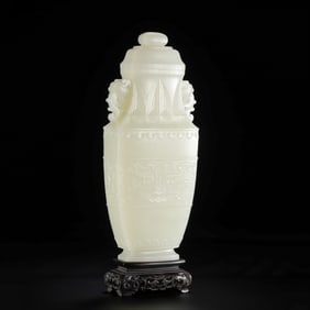 Chinese Qing Dynasty Hetian white jade double-eared covered vase with animal mask design
