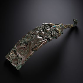 Gold and silver inlaid belt hooks from the Warring States period in China
