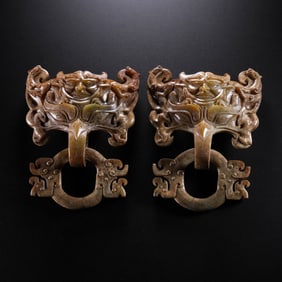A pair of Chinese Han Dynasty jade door knockers