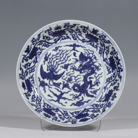 Blue and white porcelain plate with dragon and phoenix design from the Wanli period of the Ming