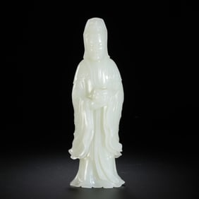 Standing Guanyin statue made of Hetian white jade from the Qing Dynasty, China