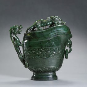 Chinese Qing Dynasty Hetian jade dragon-shaped wine vessel with ring handles