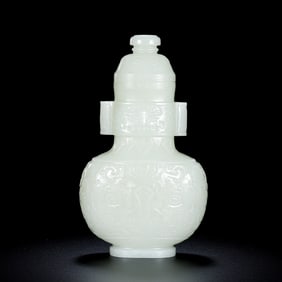Chinese Qing Dynasty Hetian white jade covered vase with tubular handles