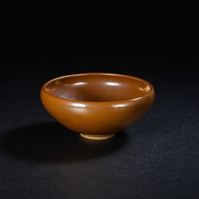 Red-glazed bowl from Yaozhou kiln during the late Tang and Five Dynasties period in China