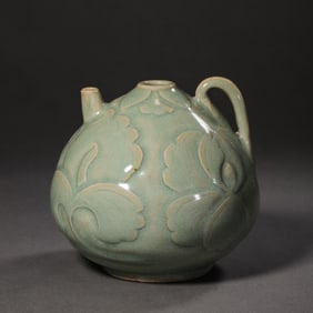 A carved floral-patterned ewer from the Yaozhou kiln during the late Tang and Five Dynasties period