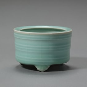 A celadon three-legged censer with string patterns from the Longquan kiln of the Southern Song