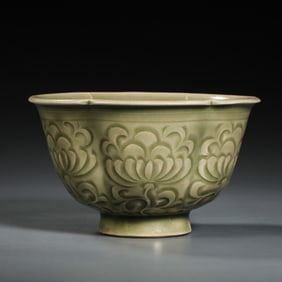 A celadon-glazed flower-shaped cup from the Yaozhou kiln during the late Tang and Five Dynasties