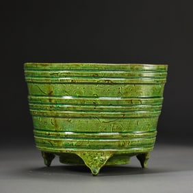 A Tang Dynasty Green-Glazed Marbled Three-Legged Incense Burner