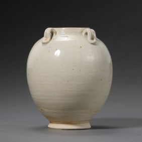 A four-handled white porcelain jar from the Gongxian kiln in the Tang Dynasty, China.
