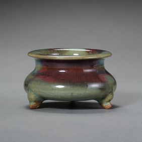 A three-legged censer with sky-blue glaze and red trim from the Jun kiln of the Northern Song