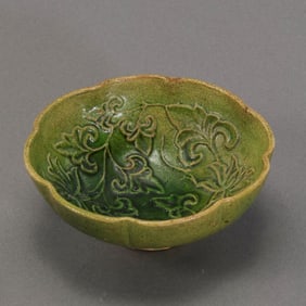 Green-glazed floral-patterned lobed cup from the late Tang and Five Dynasties period in China