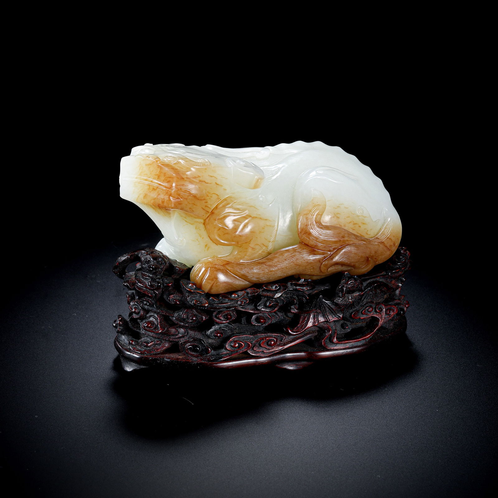 Chinese Qing Dynasty Hetian white jade reclining ox: H. 11 cm. W. 14 cm. Weight. 1106.5 gram.